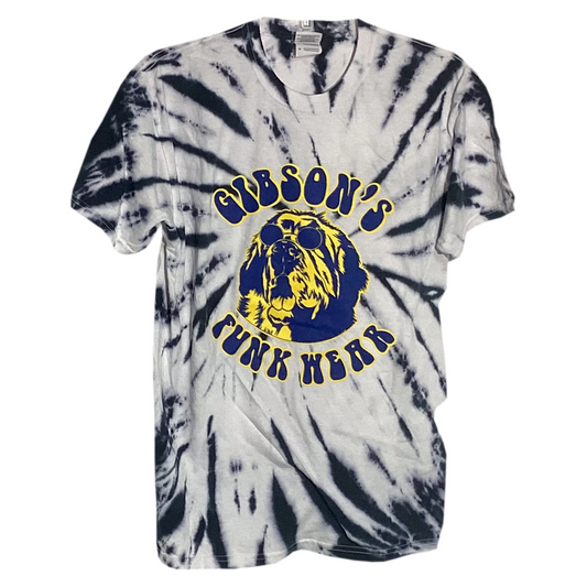 Black and white tie-dye T-shirt featuring a large yellow and blue graphic of a dog wearing sunglasses with the text "Gibson's Funk Wear" encircling it.