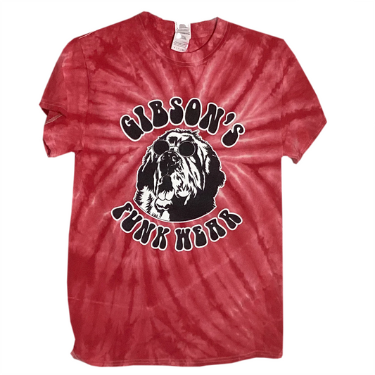 Red tie-dye T-shirt featuring a large black and white graphic of a shaggy dog wearing sunglasses with the text "Gibson's Funk Wear" encircling the image.